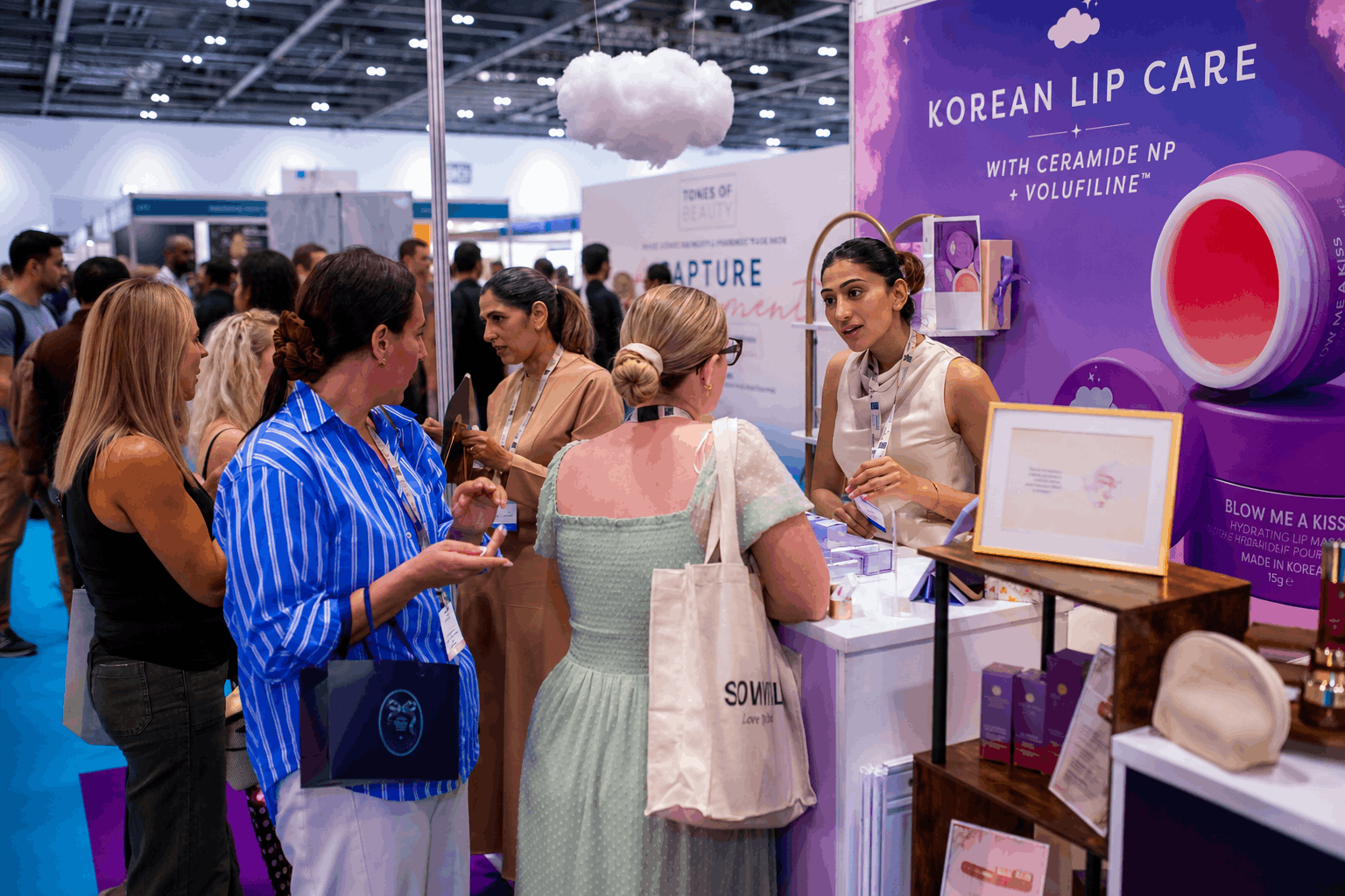Industry professionals are meeting at a booth